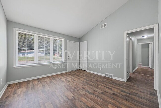 Building Photo - A Must See/ High Vaulted ceiling's & Section 8 Welcome!!!