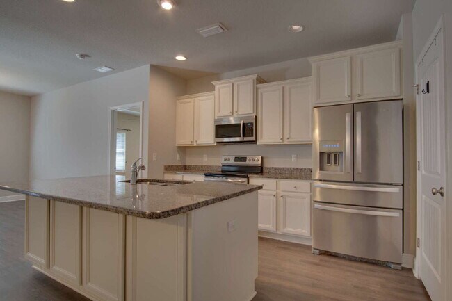 Building Photo - Ashley Plantation Living — 3BR Home with Granite Countertops, Large Kitchen Island, Trey Ceilings...