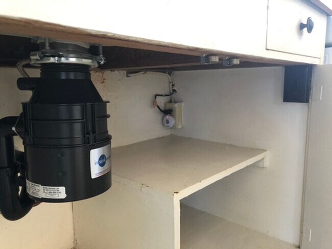 Building Photo - Central Location with Free Utilities!