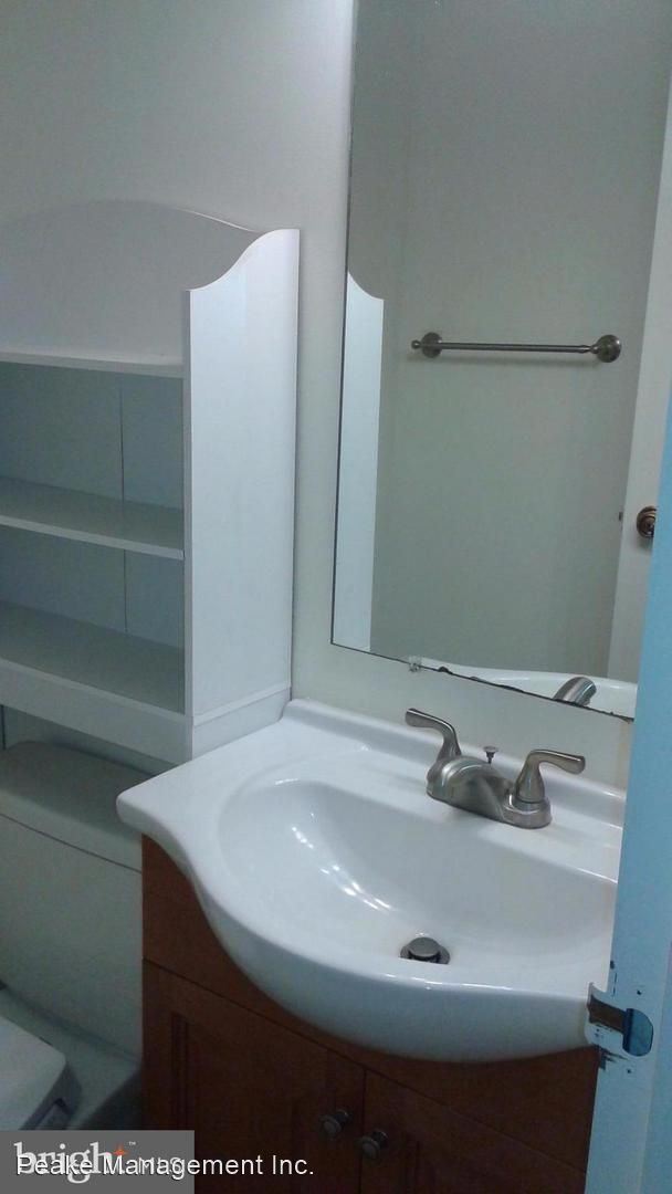 Building Photo - 2 br, 1.5 bath House - 11806 Breton Ct. #12C