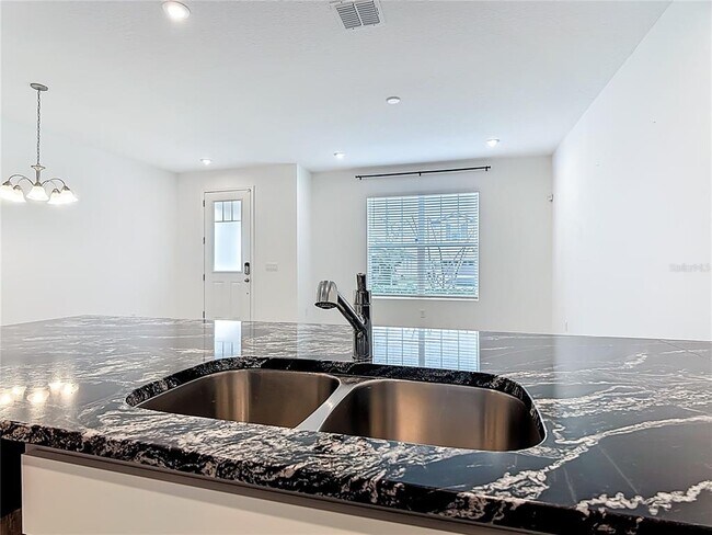 Building Photo - 2512 Blowing Breeze Ave