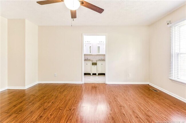 Building Photo - 6837 Woodmark Dr