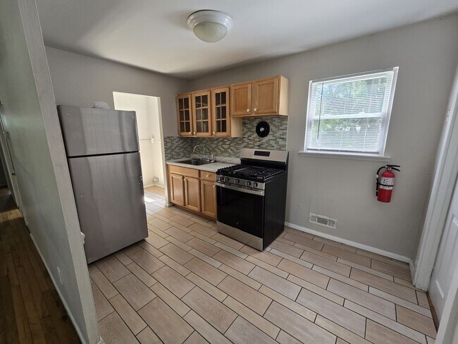 Primary Photo - 3 Bedroom, 1 Bathroom, Plus enclosed porch