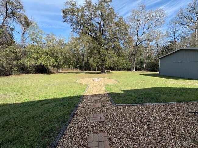 Building Photo - Available Now: Expansive 4BR Home with Rare 3-Bay Carport