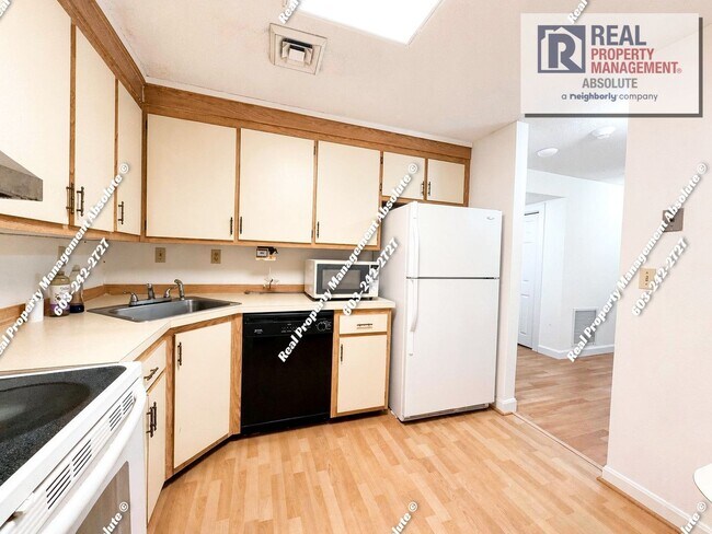 Building Photo - Spacious 2BR/2BA Condo with Garage, Balcony, Pool & Mine Falls Access