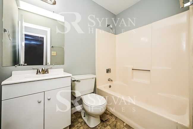 Building Photo - The living is easy in this 3 bedroom, 2 bathroom home