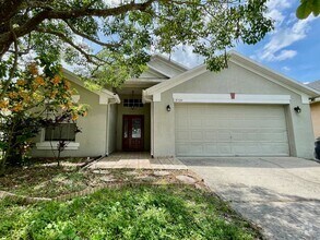 Building Photo - Modern 4-Bed, 2-Bath Solar-Powered Home Ne...