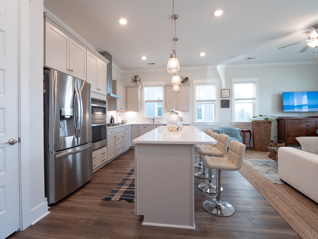 a large kitchen island - 3498 Habenaria Rd