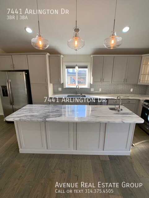Building Photo - 7441 Arlington Dr