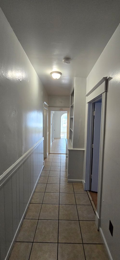Building Photo - Large remodeled 4 bedroom with off street parking available