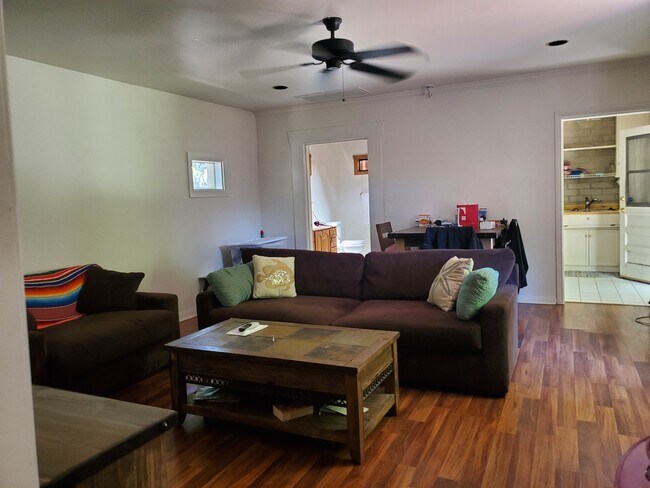 Large living room with ceiling fan - 23501 Collins St