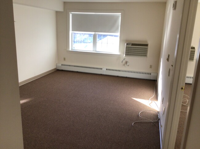 Building Photo - Carmen Romano Apartments