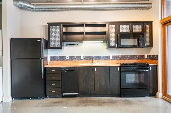 Building Photo - Old Town Lofts - South Facing Studio w/par...