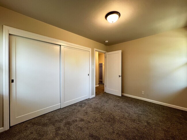 Building Photo - Freshly Renovated 3 Bedroom Home with Large Fenced Yard & Double Garage