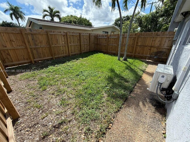 Building Photo - 4300 NW 3rd Ct