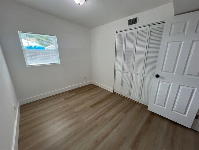Building Photo - 10540 NW 28th Ave