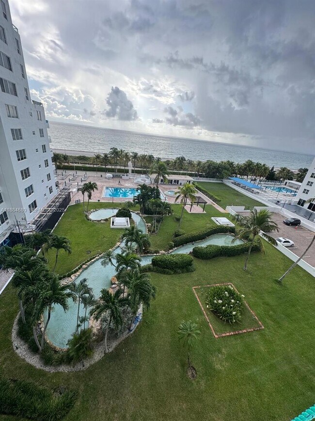 Building Photo - 5005 Collins Ave