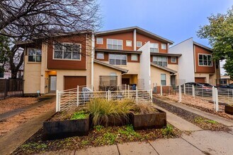 Building Photo - Modern Downtown Austin Living: 2 Suites, EV Charger, Gated Yard, and Unbeatable East Austin Vibes!