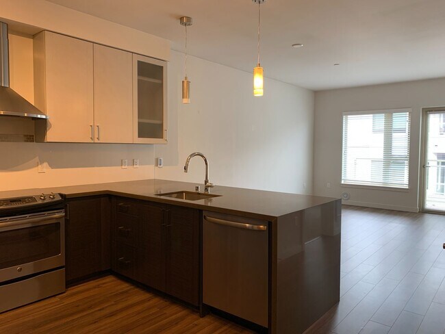 Building Photo - Urban Living at the Vik - Top Floor Condo