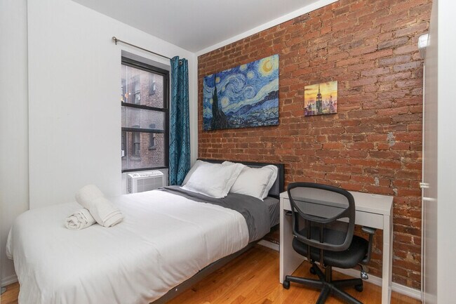 Building Photo - 309-311-311 E 95th St