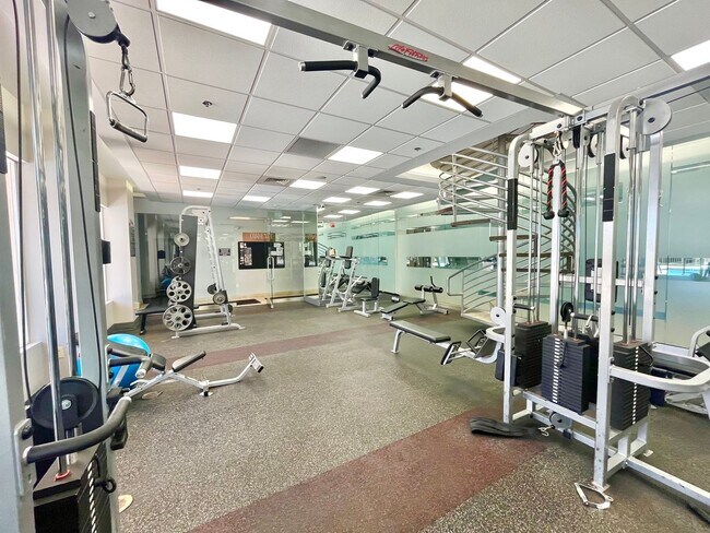Building Photo - Spacious 2 Bedroom High-Rise Condo with Resort-Style Amenities & Oversized Balcony