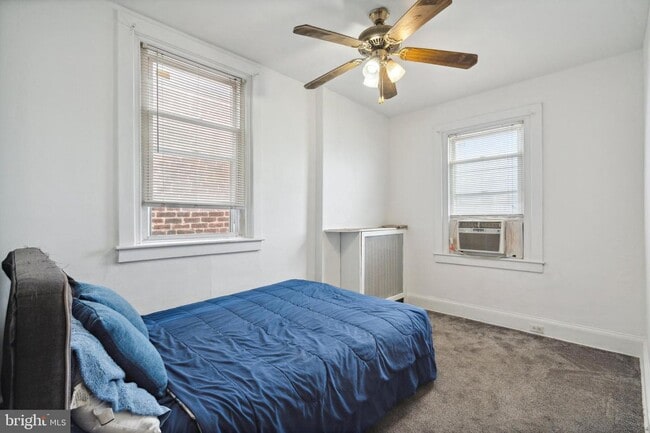 Building Photo - 7117 Woolston Ave