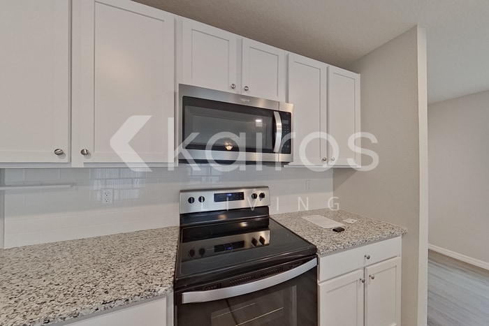 Building Photo - 8579 SW 44th Ct