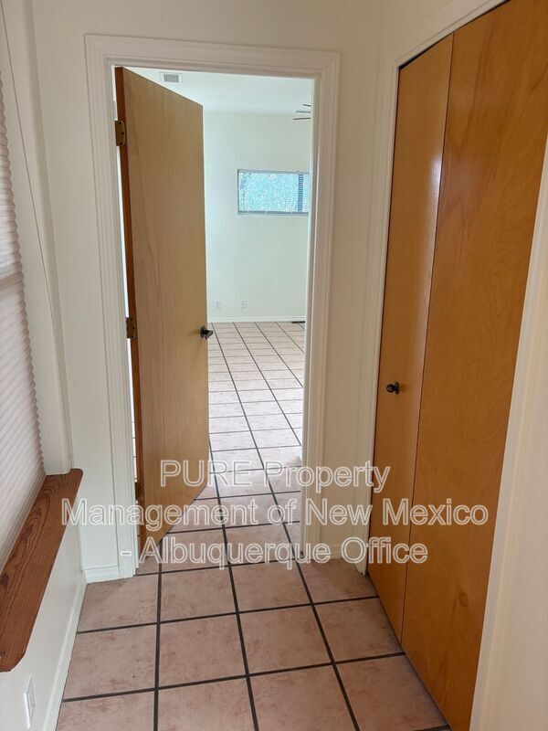 Building Photo - 8220 W Raintree Dr NE
