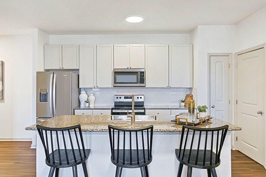 Beautifully upgraded kitchens with stainless steel appliances - Chancery Village