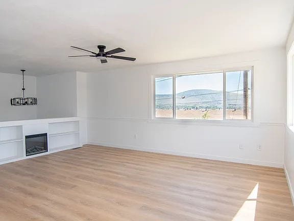 Building Photo - "Charming 5-Bed Sanctuary with Cozy Fireplace on South Rogers Street!"