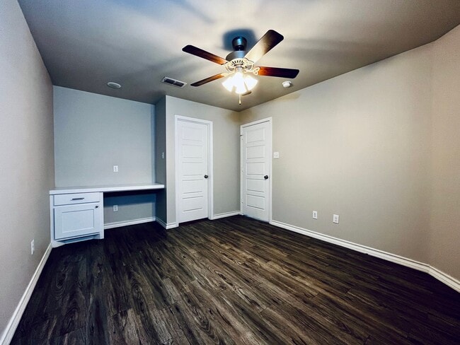 Building Photo - 4 Private Suites • Walk to Texas Tech • Modern Finishes