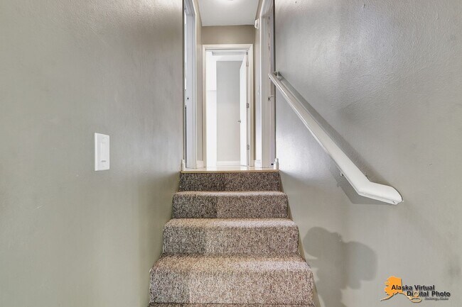 Building Photo - Eagle River Home w/ Fenced Yard, Sunroom, and Garage!