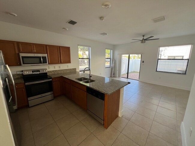 Building Photo - 9399 W 33rd Ln