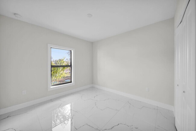 Building Photo - Brand-New Home in Lehigh Acres – Move-In Ready! FL 33974. Qualify for a deposit-free option and s...