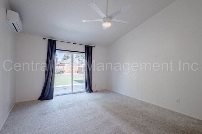 Building Photo - 4 Bedroom/2 Bath Home with a Pool and Sola...