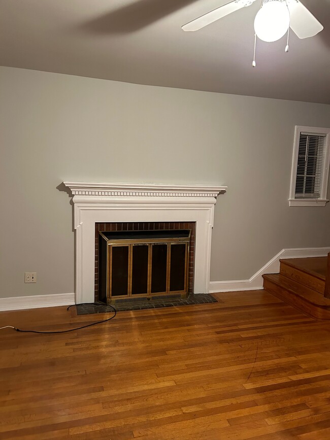 The living room features a fireplace - 836 20th St S