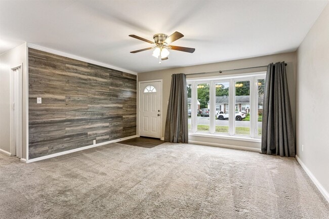 Building Photo - Charming brick rancher with modern kitchen...
