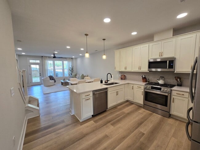 Building Photo - Rare Townhome Opportunity Near Hester Pond – Beautifully Upgraded Laurel Hills Retreat