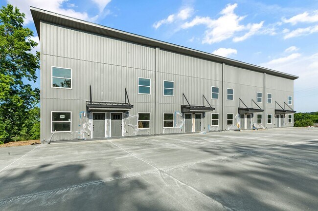 Building Photo - Brand New Townhomes 15 Minutes from Bentonville!