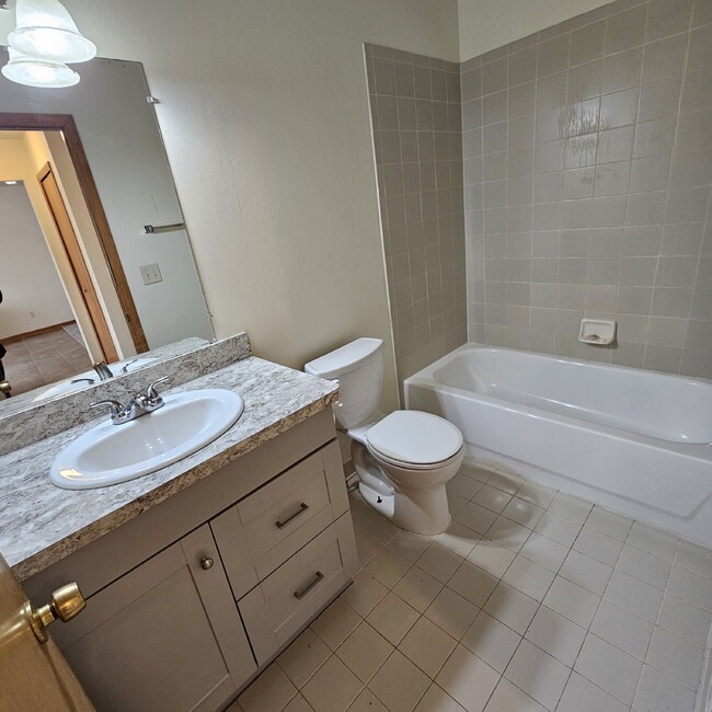 Building Photo - 2 Bedroom Upper Condo w/ Open Kitchen to Living Room Space. All Appliances Included along with Wa...