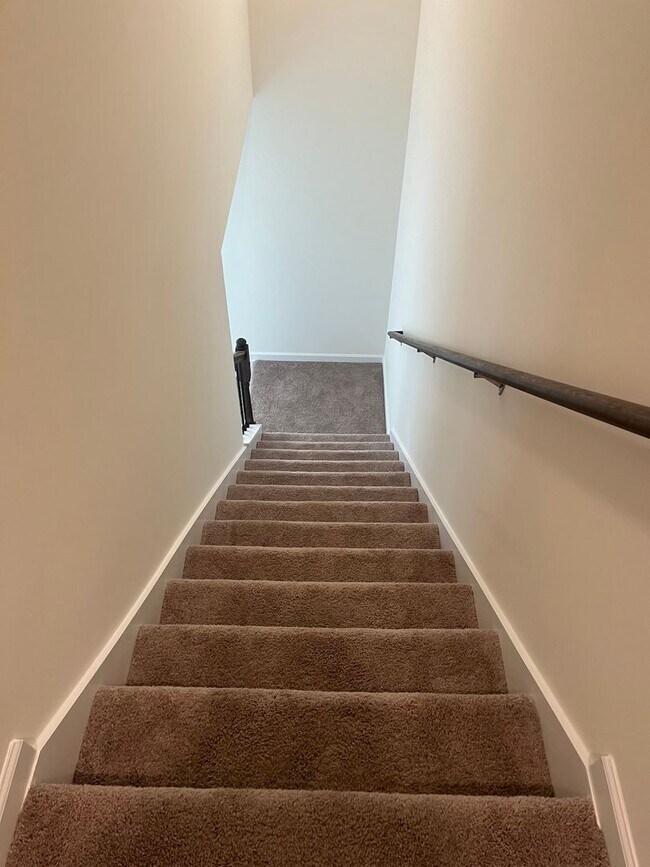 Building Photo - Brand New Townhome – Modern Comfort & Conv...
