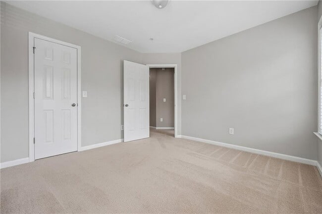 Building Photo - 4721 Creekside Villas Way