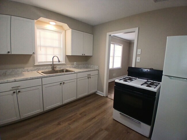 Building Photo - Stunning Renovation with Classic Character and Modern Upgrades