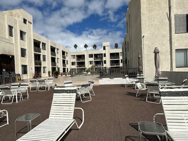Pool area and path to beach - 1140 E Ocean Blvd