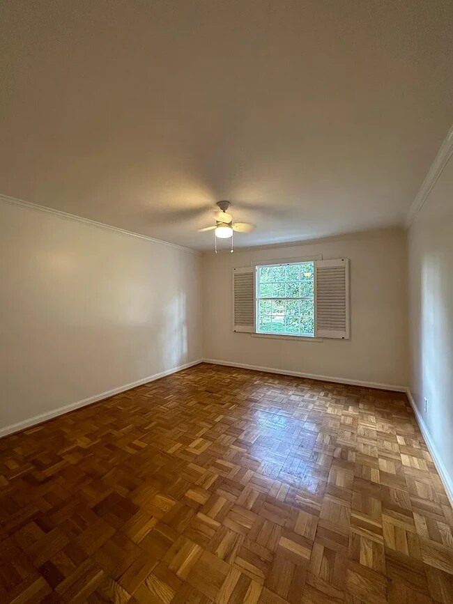 primary bedroom -- flooded with sunlight, fits a king size, and has custom closet (secondary room in - 108 Colville Rd