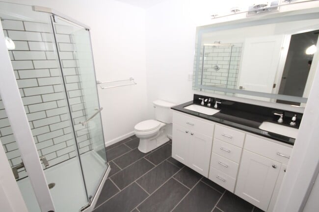 Building Photo - *Coming Soon*  Upgraded End Unit Townhome ...