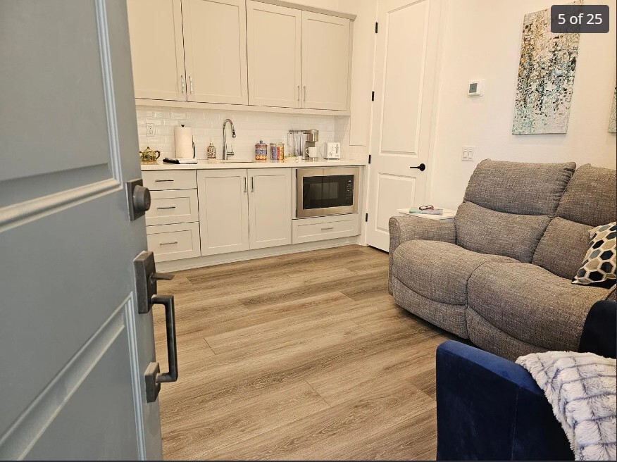Living area with kitchenette. - 607 Middlebrook Rd