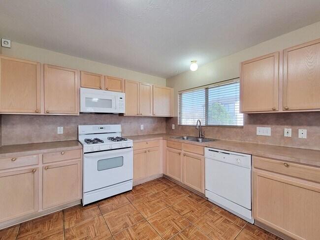 Building Photo - 3 bedroom one story home on large corner lot. Home has hard flooring throughout living areas and ...