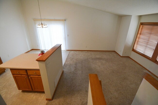 Building Photo - Spacious 3 Bed, 2 Bath Townhome with Attached Garage Available Now