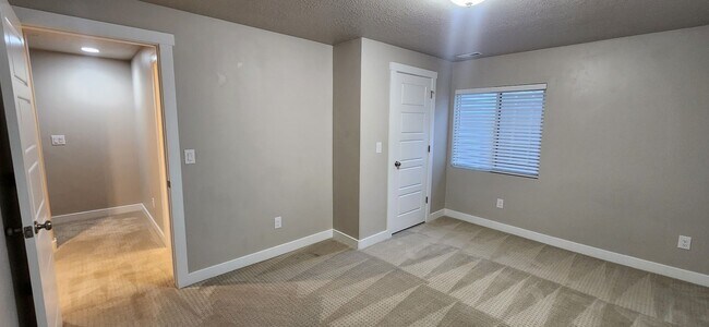 Building Photo - $2,000 OFF 4-bed, 3.5-bath Townhome Available Now!